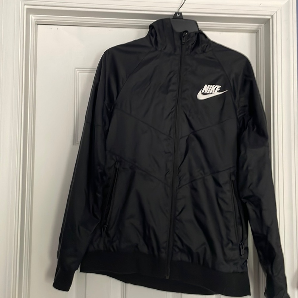 Nike size L black jacket. 100% nylon fabric.